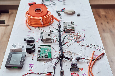 Laid out wiring harness from WeWire with all the components that it connects. 