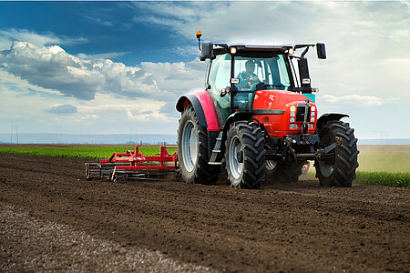 Tractor with resilient cables for moisture, dirt, and high-pressure cleaning