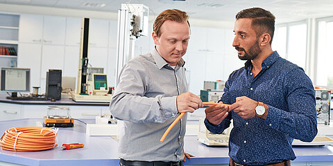 Two employees in our laboratory