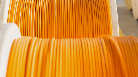 Cable drums with orange cables