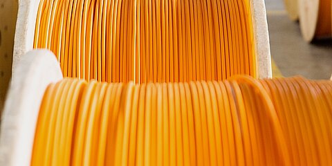 Cable drums with orange cables